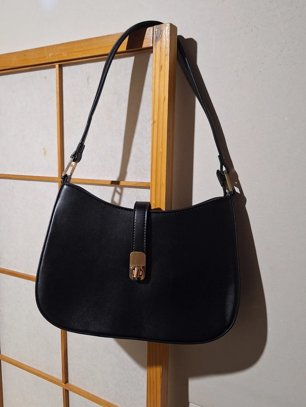 Classic Black Shoulder Bag with Gold Hardware